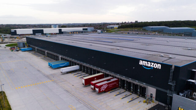 Angled aerial view of a large commercial shipping and storage building