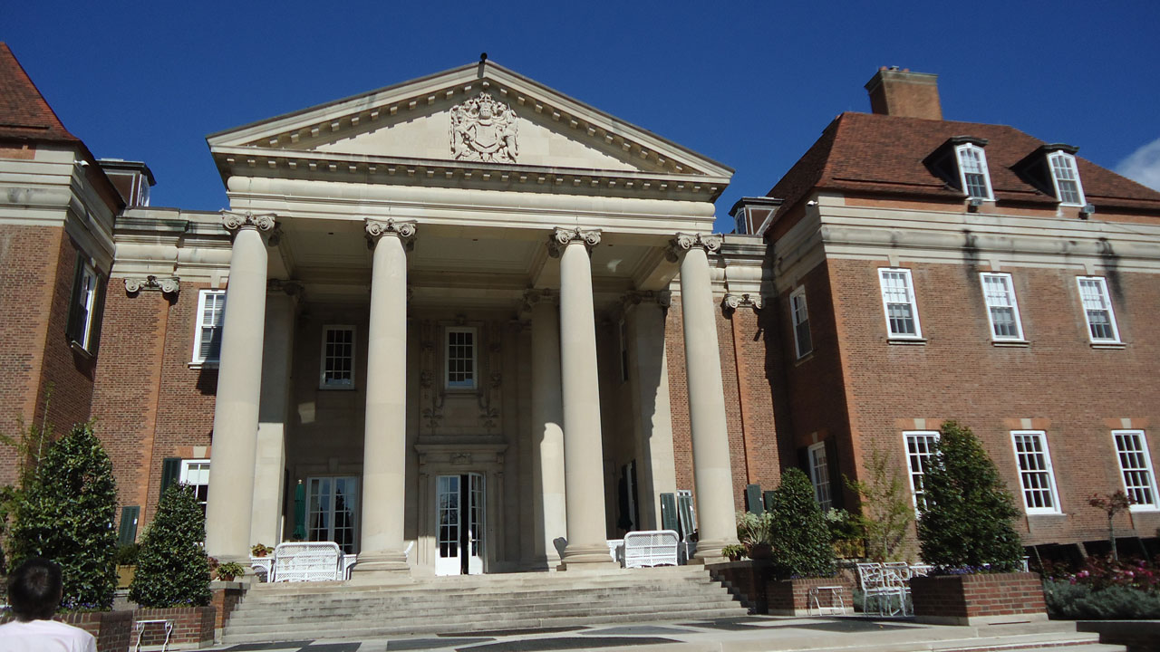 The outside of a government building, with four large pillars