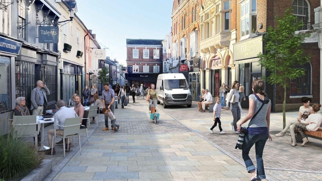 an image of saffron view with shops and people enjoying the space